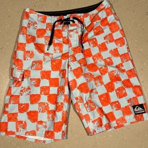 Quicksilver orange and blue checkered swim trunks Size 26. 
No lining